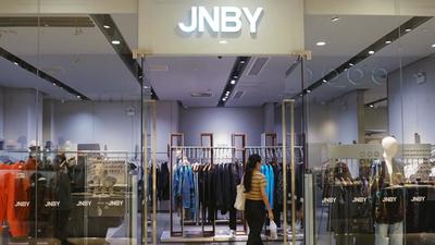 A customer visits a store of Chinese fashion label JNBY at a shopping mall in Hangzhou in China’s eastern Zhejiang province on Friday. (AFP) A customer visits a store of Chinese fashion label JNBY at a shopping mall in Hangzhou in China’s eastern Zhejiang province on Friday. (AFP)