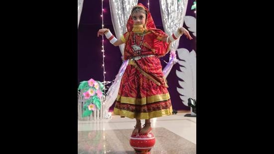 A student of BCM Arya Model Senior Secondary School giving a dance performance during the opening ceremony of the school’s annual cultural fiesta in Ludhiana on Friday. (HT Photo)