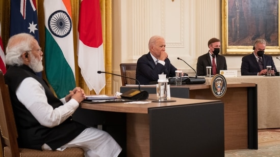 US President Joe Biden, top center, hosts a meeting with Narendra Modi, India's prime minister, left, in the East Room of the White House in Washington.(Bloomberg)