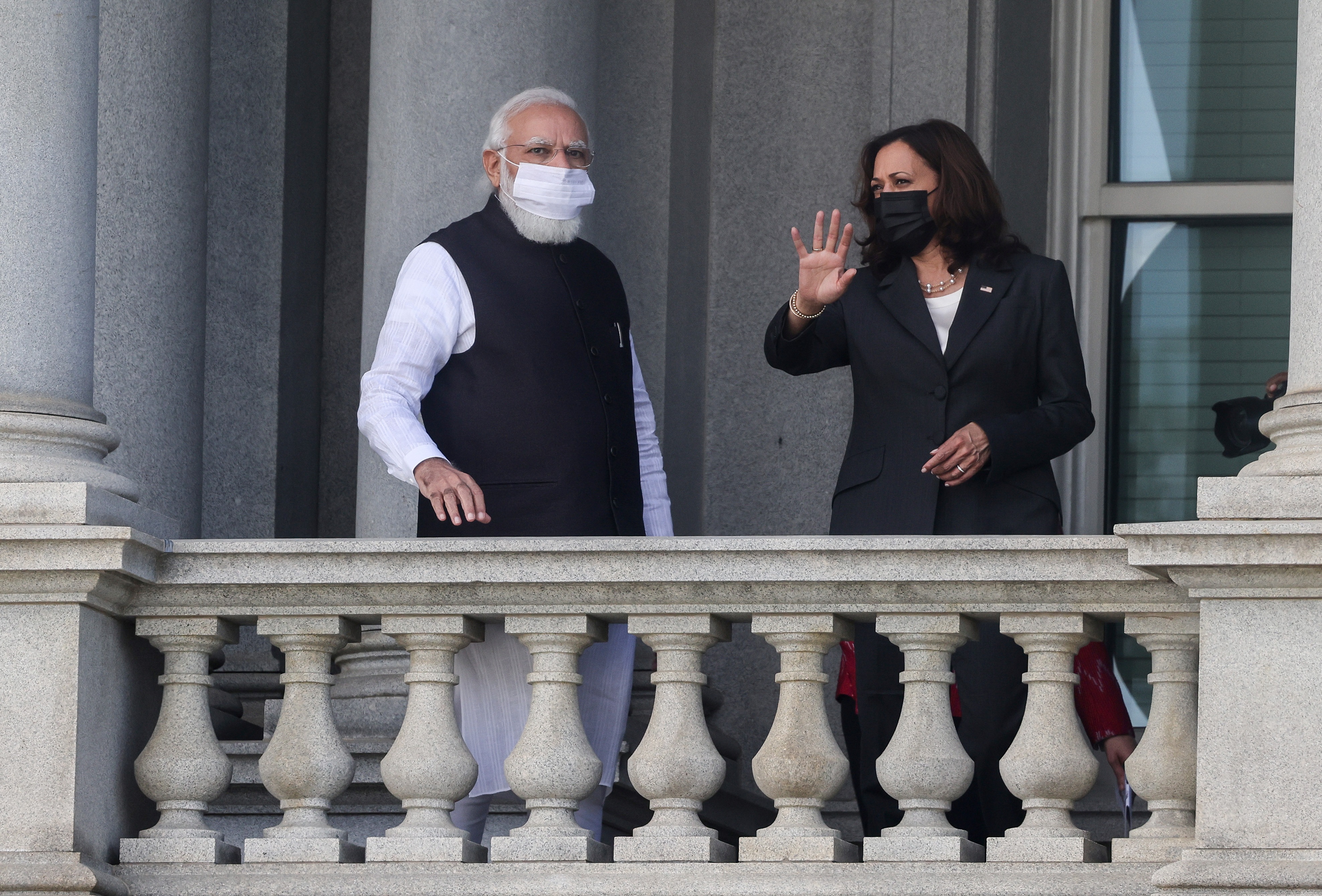 US vice-president Kamala Harris talks with Prime Minister Narendra Modi on the balcony of the Eisenhower Executive Office building at the White House complex in Washington.&nbsp; (Evelyn Hockstein / REUTERS)