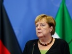 German Chancellor Angela Merkel addresses a news conference in Hagen,