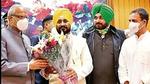Punjab chief minister Charanjit Singh Channi (second from left) being felicitated by governor Banwarilal Purohit after he was sworn in at Raj Bhawan in Chandigarh on September 20 as Congress leaders Rahul Gandhi and Navjot Singh Sidhu look on, (HT file photo) Punjab chief minister Charanjit Singh Channi (second from left) being felicitated by governor Banwarilal Purohit after he was sworn in at Raj Bhawan in Chandigarh on September 20 as Congress leaders Rahul Gandhi and Navjot Singh Sidhu look on, (HT file photo)