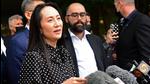 Huawei chief financial officer Meng Wanzhou (centre) talks to media at British Columbia Supreme Court after her extradition hearing ended in her favour, in Vancouver British Columbia, Canada on Friday. (AFP) Huawei chief financial officer Meng Wanzhou (centre) talks to media at British Columbia Supreme Court after her extradition hearing ended in her favour, in Vancouver British Columbia, Canada on Friday. (AFP)