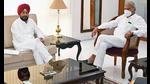 Punjab chief minister Charanjit Singh Channi with governor Banwarilal Purohit in Chandigarh on Saturday. Channi met the governor to seek time for oath ceremony of his ministers. (ANI Photo/Twitter) Punjab chief minister Charanjit Singh Channi with governor Banwarilal Purohit in Chandigarh on Saturday. Channi met the governor to seek time for oath ceremony of his ministers. (ANI Photo/Twitter)