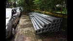 New electric poles lying to be erected across Navi Mumbai. The NMMC will replace 25-year-old electric poles with new ones. (BACHCHAN KUMAR/HT PHOTO) New electric poles lying to be erected across Navi Mumbai. The NMMC will replace 25-year-old electric poles with new ones. (BACHCHAN KUMAR/HT PHOTO)