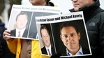 People hold signs calling for China to release Canadian detainees Michael Spavor and Michael Kovrig.(Reuters) People hold signs calling for China to release Canadian detainees Michael Spavor and Michael Kovrig.(Reuters)