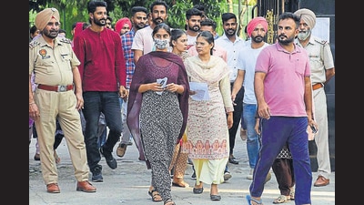Candidates leaving the examination centre after appearing for the Punjab Police constable recruitment exam at Sacred Heart School in Ludhiana on Saturday. (Harsimar Pal Singh/HT)