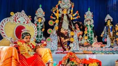 Participate in Kumari Puja: This is another important ritual performed during Durga Puja. Different forms of Maa Durga are worshipped during the festival. On the day of Kumari Puja, the form of an innocent young unmarried virgin girl is worshipped. (Instagram/@djrohan_clicks)
