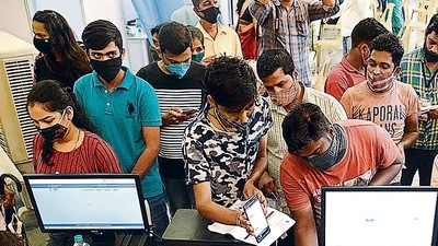 People register to receive a dose of the Covaxin vaccine against the Covid-19 coronavirus at Dr. Antonio Da Silva High School in Mumbai. (AFP file photo) People register to receive a dose of the Covaxin vaccine against the Covid-19 coronavirus at Dr. Antonio Da Silva High School in Mumbai. (AFP file photo)