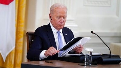 President Joe Biden attends the Quad summit with Australian Prime Minister Scott Morrison, Indian Prime Minister Narendra Modi, and Japanese Prime Minister Yoshihide Suga, in the East Room of the White House on September 24 in Washington. (AP) President Joe Biden attends the Quad summit with Australian Prime Minister Scott Morrison, Indian Prime Minister Narendra Modi, and Japanese Prime Minister Yoshihide Suga, in the East Room of the White House on September 24 in Washington. (AP)