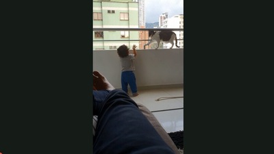 The video shows the cat protecting the kid. (Jukin Media)