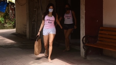 Apart from setting workout goals for their fans, Janhvi and Sara also serve styling cues for nailing the perfect gym ensemble. They are often spotted flaunting their wide gym wear collection outside the Pilates studio, and today is one such day. The actors twinned in similar-looking workout sets and inspired us to hit the gym with our best friend. (HT Photo/Varinder Chawla)