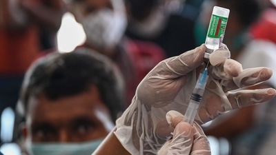 Kerala has set itself the target of vaccinating 100% of its eligible population with at least one dose of the vaccine by September 30. (AFP | Representational image) Kerala has set itself the target of vaccinating 100% of its eligible population with at least one dose of the vaccine by September 30. (AFP | Representational image)