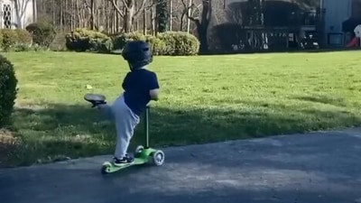 The image shows a kid on a scooter. (Instagram/@mignonettetakespictures)