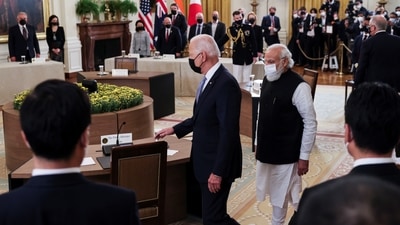 US President Joe Biden leads the way as he and India's Prime Minister Narendra Modi arrive for a 'Quad nations' meeting at the Leaders' Summit of the Quadrilateral Framework held in the East Room at the White House in Washington on September 24. (REUTERS)