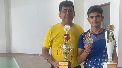 Lakshay of Sacred Heart School, Ludhiana, who has qualified for senior national badminton championship, is being coached by his father Mangat Rai Sharma. (HT Photo) Lakshay of Sacred Heart School, Ludhiana, who has qualified for senior national badminton championship, is being coached by his father Mangat Rai Sharma. (HT Photo)