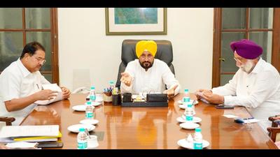 Punjab chief minister Charanjit Singh Channi with his deputies Sukhjinder Singh Randhawa and OPSoni at the first cabinet meeting after taking charge earlier this week. The cabinet expansion is slated on Sunday. (HT Photo)