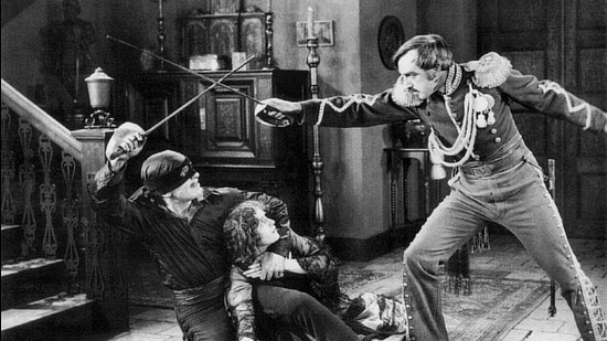 Douglas Fairbanks, the original swashbuckler, in The Mark of Zorro (1920), a film with later echoes in Batman.
