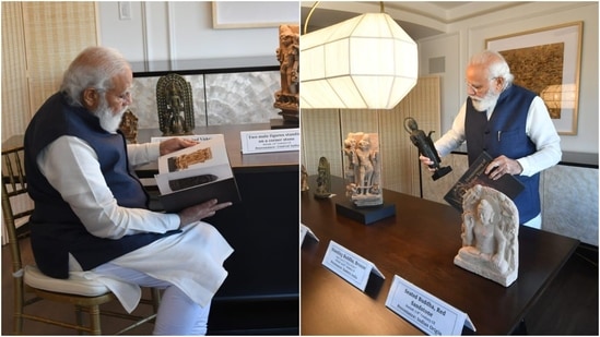 PM Modi taking a look at the artefacts US handed over.