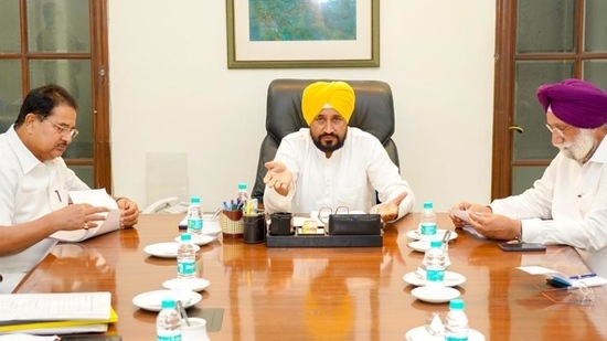 Punjab chief minister Charanjit Singh Channi with his deputies Sukhjinder Singh Randhawa and OPSoni. (HT Photo)