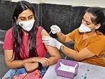 A medical worker vaccinates a woman against Covid-19, in Amritsar. (Sameer Sehgal /HT) A medical worker vaccinates a woman against Covid-19, in Amritsar. (Sameer Sehgal /HT)