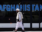 Taliban walks at the airport in Kabul. Taliban walks at the airport in Kabul.