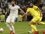 Karim Benzema of Real Madrid in action against Pau Torres (R) of Villarreal CF. Karim Benzema of Real Madrid in action against Pau Torres (R) of Villarreal CF. 