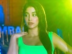 Janhvi Kapoor teams neon green bralette-bodycon skirt with bold make-up at Global Citizen Live(Instagram/@lakshmilehr) Janhvi Kapoor teams neon green bralette-bodycon skirt with bold make-up at Global Citizen Live(Instagram/@lakshmilehr)