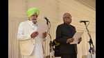 Congress MLA Rana Gurjit Singh taking oath as a minister in the presence of the Punjab governor. Congress MLA Rana Gurjit Singh taking oath as a minister in the presence of the Punjab governor.