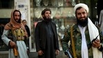 Taliban fighters stand guard on the backdrop of shops selling antiques and decorative merchandise at Chicken Street in Kabul on September 26, 2021. (AFP) Taliban fighters stand guard on the backdrop of shops selling antiques and decorative merchandise at Chicken Street in Kabul on September 26, 2021. (AFP)