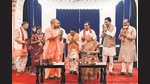 Uttar Pradesh chief minister Yogi Adityanath with newly sworn-in state ministers, during expansion of the Cabinet ahead of UP Assembly elections, in Lucknow on Sunday. (PTI) Uttar Pradesh chief minister Yogi Adityanath with newly sworn-in state ministers, during expansion of the Cabinet ahead of UP Assembly elections, in Lucknow on Sunday. (PTI)