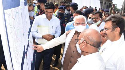 Haryana chief minister Manohar Lal Khattar taking stock of development projects in Karnal on Sunday. (HT Photo)