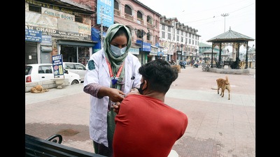 A man getting a dose of the Covid vaccine during a vaccination drive in Srinagar on Friday. (ANI)