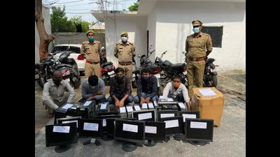The five suspects in police custody on Saturday. (Sourced)