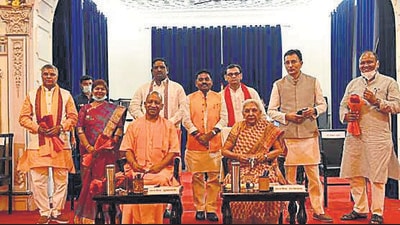 The seven new ministers with Uttar Pradesh chief minister Yogi Adityanath and governor Anandiben Patel in Lucknow on Sunday. (Deepak Gupta/HT) The seven new ministers with Uttar Pradesh chief minister Yogi Adityanath and governor Anandiben Patel in Lucknow on Sunday. (Deepak Gupta/HT)