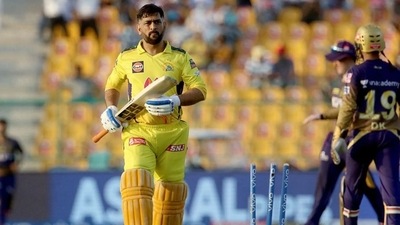 KKR's Varun Chakravarthy dismisses CSK captain MS Dhoni during IPL 2021 match no 38 in Abu Dhabi (iplt20.com)