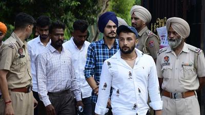 Candidates leaving the examination centre after appearing for the Punjab Police constable recruitment exam at Sacred Heart School in Ludhiana on Sunday. (Harsimar Pal Singh/HT)