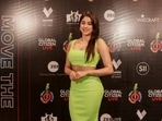 Janhvi Kapoor in a neon green outfit. Janhvi Kapoor in a neon green outfit.