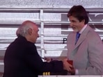 Yash Chopra presents Amitabh Bachchan with an award. Yash Chopra presents Amitabh Bachchan with an award.