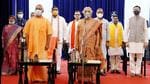 The BJP leaders, who were inducted into the council of ministers, with chief minister Yogi Adityanath and governor Anandiben Patel at the swearing-in ceremony. (ANI Photo) The BJP leaders, who were inducted into the council of ministers, with chief minister Yogi Adityanath and governor Anandiben Patel at the swearing-in ceremony. (ANI Photo)