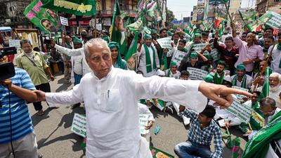 Bihar RJD president Jagdanand Singh with supporters in Patna during Bharat Bandh against Central government's three farm reform laws. (PTI Photo) Bihar RJD president Jagdanand Singh with supporters in Patna during Bharat Bandh against Central government's three farm reform laws. (PTI Photo)