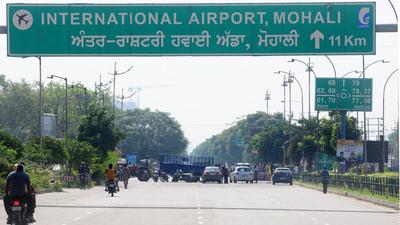 Farmers blocking the Airport Road during the Bharat Bandh in Mohali on Monday. (Ravi Kumar/HT) Farmers blocking the Airport Road during the Bharat Bandh in Mohali on Monday. (Ravi Kumar/HT)