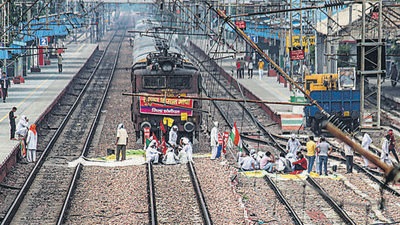 Farmers block railway tracks as part of protests against the agricultural laws during Bharat Bandh protests, at Sonipat Railway Station in Haryana on Monday. (PTI) Farmers block railway tracks as part of protests against the agricultural laws during Bharat Bandh protests, at Sonipat Railway Station in Haryana on Monday. (PTI)