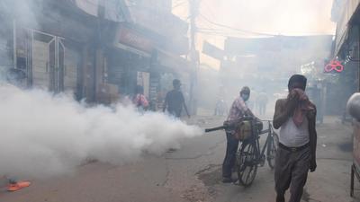 An east corporation worker in Delhi worker fumigates Ganesh Nagar area. An official of the corporation said, “Nowadays, we see cases being reported well into November. Earlier, the number of cases used to go down mid-October, as temperatures started dropping.” (Raj K Raj/HT Photo) An east corporation worker in Delhi worker fumigates Ganesh Nagar area. An official of the corporation said, “Nowadays, we see cases being reported well into November. Earlier, the number of cases used to go down mid-October, as temperatures started dropping.” (Raj K Raj/HT Photo)