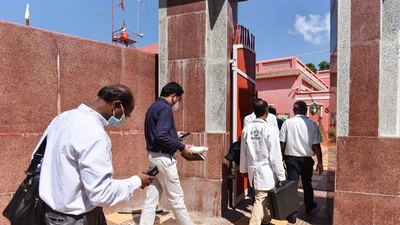 Central Bureau of Investigation (CBI) officers during investigation after the death of Akhil Bharatiya Akhara Parishad President Mahant Narendra Giri Maharaj, at Baghambari Gaddi Math in Prayagraj.&nbsp; (PTI Photo)