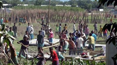 Villagers protest against an eviction drive in Assam’s Darrang district on September 23. (PTI) Villagers protest against an eviction drive in Assam’s Darrang district on September 23. (PTI)