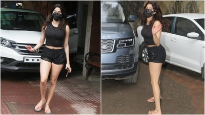 Janhvi was snapped outside the Pilates Studio post a workout session in Mumbai today. For the outing, Janhvi chose all-black separates and showed us how to look stylish while working out. We are taking notes out of her style book, and you should too. (HT Photo/Varinder Chawla)