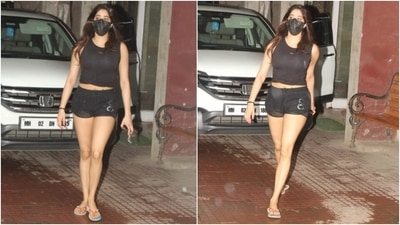 The actor teamed the cropped tank top with matching black workout shorts and showed off her svelte frame. She completed the look with a black face mask to keep herself safe during the pandemic and multi-coloured flip flops. (HT Photo/Varinder Chawla)