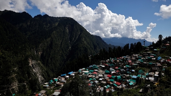 An aerial view of Malana village in Himachal Pradesh, on September 14. During a rest break on the trek, Gupta said that to convince Malana's 1,100 adults to take their first shots in August, its district chief had priests invoke a local Hindu deity. This helped health workers cover up to 700 people in three days, Gupta told Reuters.(Adnan Abidi / REUTERS)