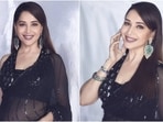Madhuri Dixit in sheer black Manish Malhotra saree and sleeveless blouse is too glam to give a damn(Instagram/@madhuridixitnene)
